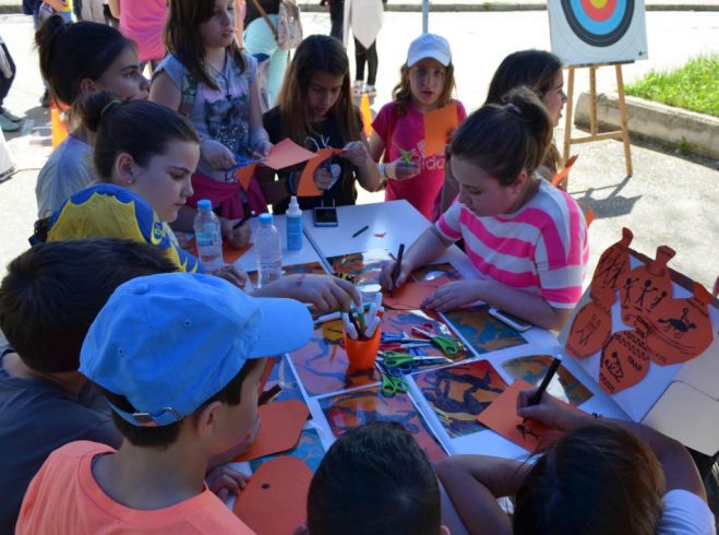 &Sigma;&Upsilon;&Mu;&Mu;&Epsilon;&Tau;&Omicron;&Chi;&Eta; &Tau;&Omicron;&Upsilon; &Omicron;&Lambda;&Upsilon;&Mu;&Pi;&Iota;&Alpha;&Kappa;&Omicron;&Upsilon; &Mu;&Omicron;&Upsilon;&Sigma;&Epsilon;&Iota;&Omicron;&Upsilon; &Sigma;&Tau;&Eta; &Mu;&Alpha;&Theta;&Eta;&Tau;&Iota;&Alpha;&Delta;&Alpha; &Alpha;&Theta;&Lambda;&Eta;&Tau;&Iota;&Sigma;&Mu;&Omicron;&Upsilon; &Kappa;&Alpha;&Iota; &Pi;&Omicron;&Lambda;&Iota;&Tau;&Iota;&Sigma;&Mu;&Omicron;&Upsilon; &Delta;&Upsilon;&Tau;&Iota;&Kappa;&Eta;&Sigma; &Mu;&Alpha;&Kappa;&Epsilon;&Delta;&Omicron;&Nu;&Iota;&Alpha;&Sigma;